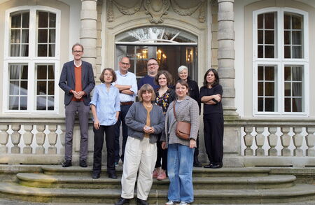 Group photo in front of the terrace entrance at Schloss Wiepersdorf
