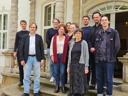 The participants in the “Person on Paper” group fellowship are standing on the terrace of Wiepersdorf Castle